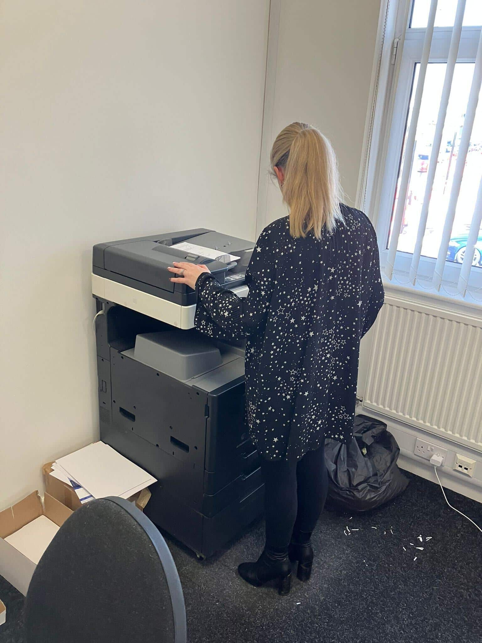 Go2Mortgage Team Using Printer